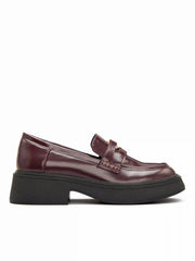 Mocasines con tacón grueso y punta redonda