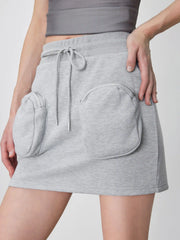 Terry Mid Rise Zipper Pocket Knotted Mini Skirt