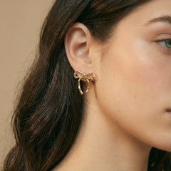 TEXTURED BOWKNOT STUD EARRINGS