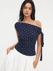 Cotton-blend Asymmetrical Neck Polka Dot Ruched Knotted Top