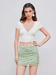V-neck Solid Bowknot Crop Top & Mesh High Rise Floral Lettuce Trim Mini Skirt Set