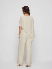 Asymmetrical Cloak Sleeve Mid Rise Wide Leg Jumpsuit With Cape