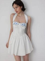 Vestido Mini de Algodão com Estampa Floral, Decote Halter, Manga Curta, Bordado e Laço