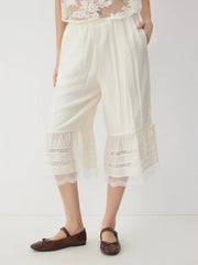 Textured Mid Rise Lace Panel Ruffle Hem Capri Shorts